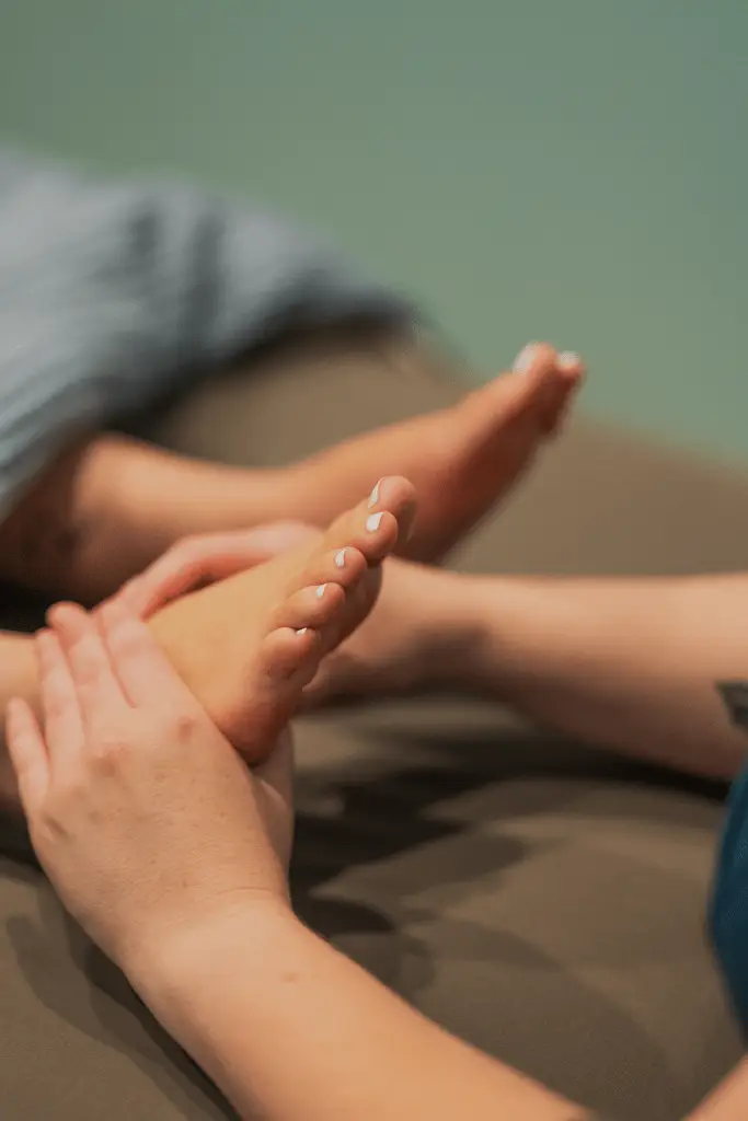 Client receiving foot massage during an immuno massage at Balnce Spa